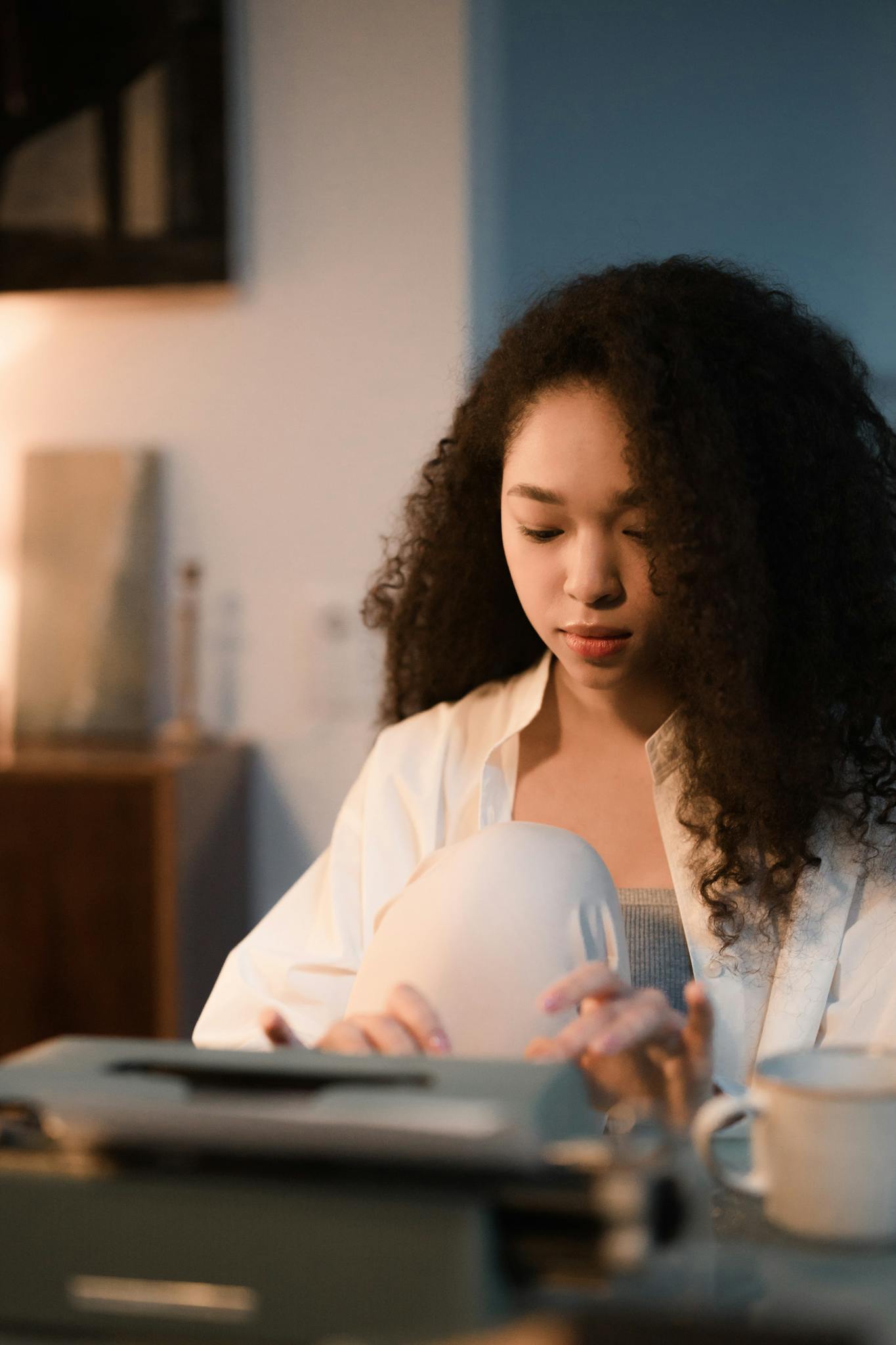 selective focus of a woman typing a